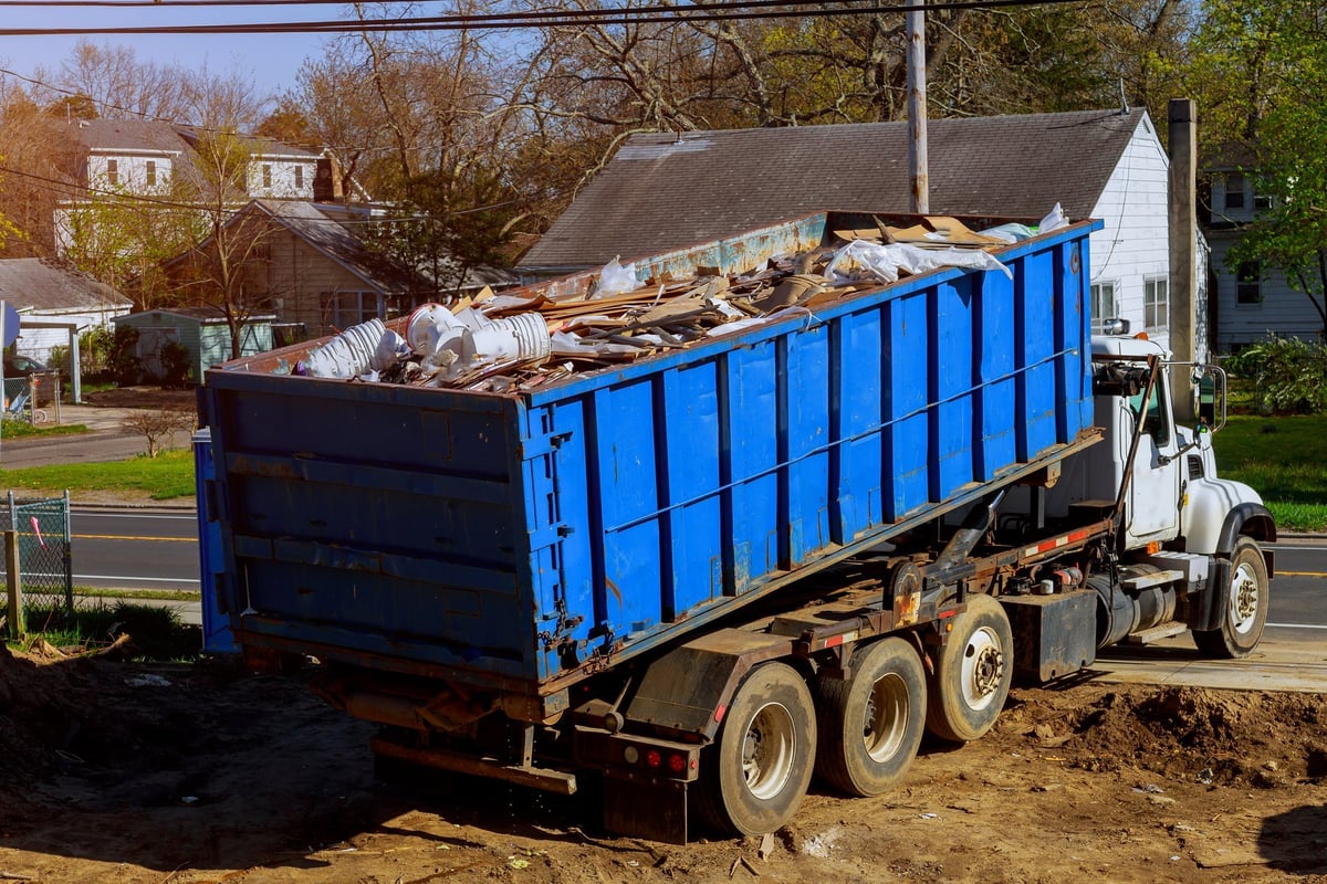 Recycling container trash dumpsters full of garbage ready for removal